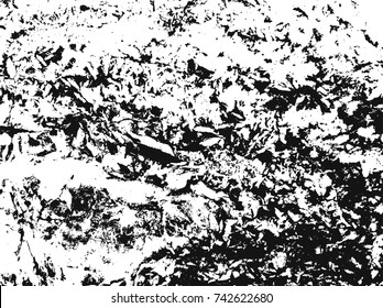 Spotty surface. White, black background.