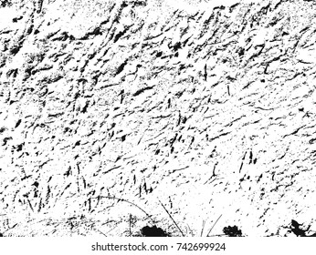 Spotty surface. White, black background.