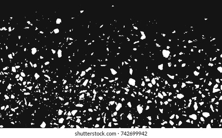 Spotty surface. White, black background.