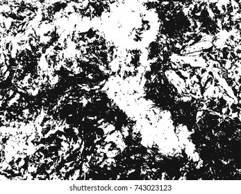 Spotty surface. White, black background.