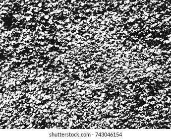 Spotty surface. White, black background.