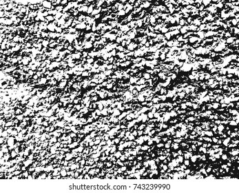 Spotty surface. White, black background.