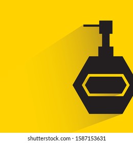spray bottle with drop shadow in yellow background
