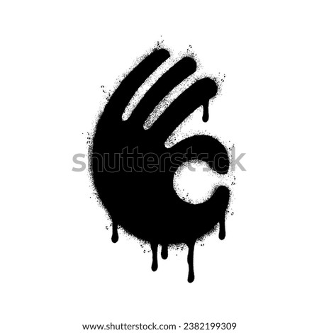 Spray Painted Graffiti hand ok sign Sprayed isolated with a white background. graffiti Perfectly ok hand with over spray in black over white.
