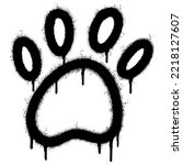 Spray Painted Graffiti Paw Print icon Sprayed isolated with a white background. graffiti paw icon with over spray in black over white. Vector illustration.