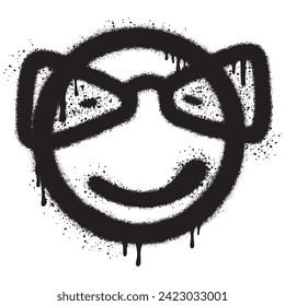 Emoticono facial sonriente de graffiti pintado con aerosol.