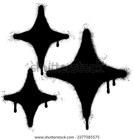 Spray Painted Graffiti stars sparkle icon icon Sprayed isolated with a white background. graffiti shining burst with over spray in black over white.