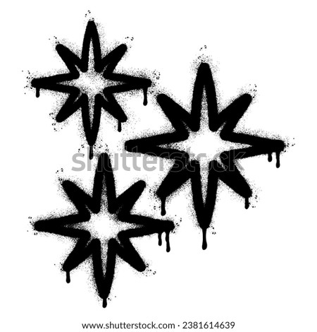 Spray Painted Graffiti stars sparkle icon icon Sprayed isolated with a white background. graffiti shining burst with over spray in black over white.