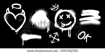 Spray painted graffiti symbols set,heart with horns, smiley face, arrows,abstract elements for street art designs, urban projects, posters, backgrounds, creative digital artwork.Vector illustration