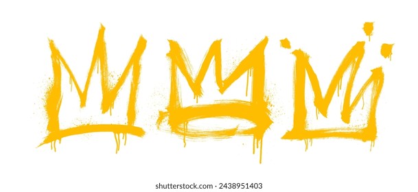 Spray painted graffiti yellow crown signs with drips. Graffiti drawing symbols isolated on white. Grunge bold crowns with spray texture. Street art style drawing. Brush drawn grunge rough symbols.