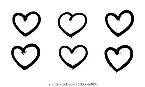 Sprayed graffiti hearts set in black on white. Vector illustration EPS 10