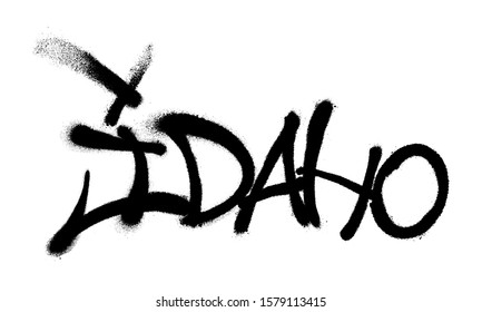 Sprayed Idaho font graffiti with overspray in black over white. Vector illustration.