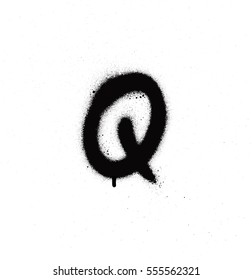 sprayed Q font graffiti with leak in black over white