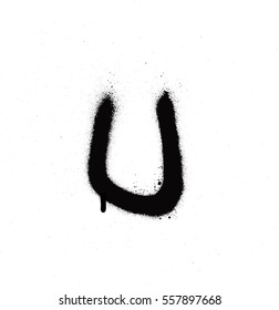 sprayed U font graffiti with leak in black over white