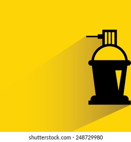 sprayer bottle on yellow background, flat and shadow theme