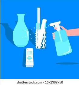 spraying disinfectant on frequently used items