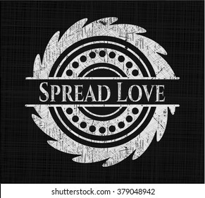 Spread Love written on a chalkboard