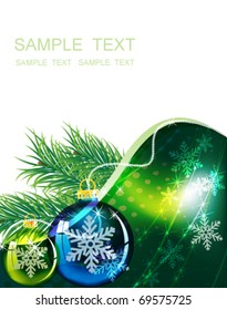 Sprigs of fir and glass Christmas balls on an abstract background