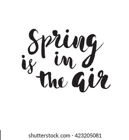 "Spring is in the air" hand drawn inspiration quote.Vector  typography poster design. Ink  lettering in black and white colors