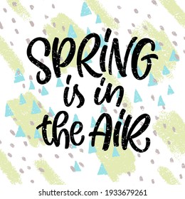 Spring is in the air. Hand drawn lettering on geometric background. Textured vector illustration for party invitation, greeting card, poster, scrapbooking, sticker, social media design