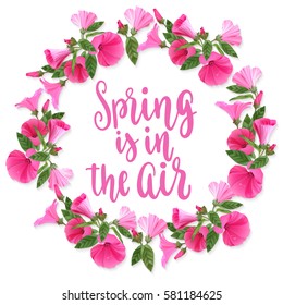 Spring is in the air. Handwritten vintage lettering quote. Vector illustration on white background with decorative pink flowers for greeting card, poster or leaflet.