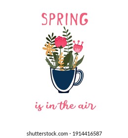 Spring is in the air text. Cup with flowers. Mug with florals. Springtime.