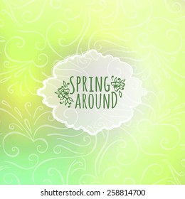 Spring around lettering on abstract blurry background. Vector illustration