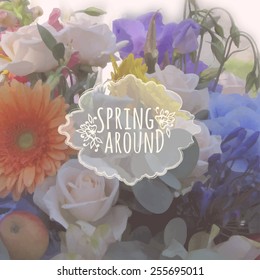 Spring around lettering on unfocused floral background. Vector illustration