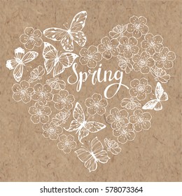 Spring background with butterflies and flowers of cherry. Vector illustration of heart shape on a  kraft paper. 