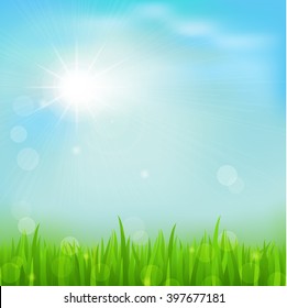 Spring background with green early spring grass on blurred soft background. Grassland blurred background with sun rays on blue cloudy sky. Vector illustration.