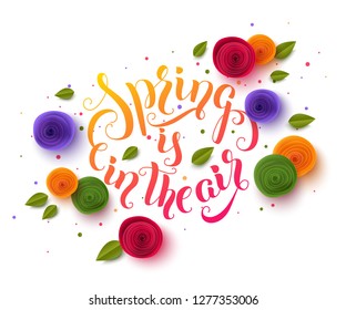 Spring background with paper cut flowers and leaves. Spring is in the air lettering design