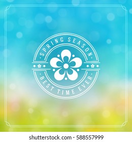 Spring Badge Vector Typographic Design Greeting Card. Spring Blurred lights Background and flowers. Eps 10.