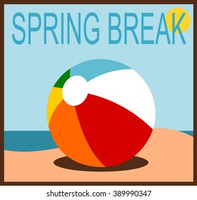 spring break design with beach ball on sand