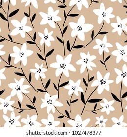 Spring bright seamless floral pattern with white hand drawn flowers and black leaves on beige background. Ditsy print. Vector illustration