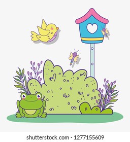 spring bushes with plants leaves and frog