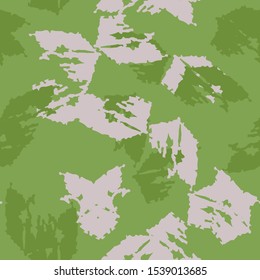Spring camouflage of various shades of green and beige colors. It is a colorful seamless pattern that can be used as a camo print for clothing and background and backdrop or computer wallpaper
