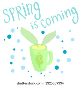 Spring comes, the words in ultraviolet and green shades. Spring concept. Mug with hot drink.