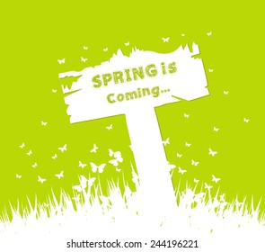 Spring is coming concept with sign post