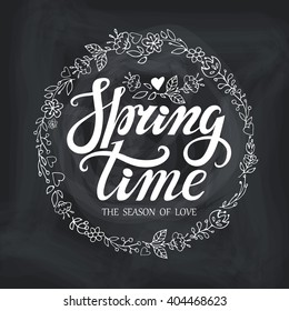 Spring design,Handwriting lettering,quotes,doodle floral wreath.Spring time poster.Vector words,Chalkboard background.Springtime Typographic poster.Web,print,calligraphic Illustration.Season of love