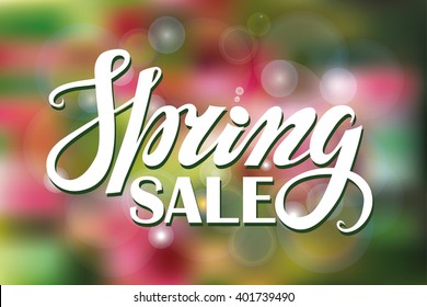 Spring design,Handwriting lettering,quotes.Sale.Vector Green,pink blurred background.Spring season,springtime wallpaper,text.Web, art, calligraphic Illustration.Horizontal