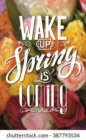 Spring design,Handwriting lettering,quotes.Vector Wake up!Spring is coming.Flower roses blurred background.Spring day season,springtime wallpaper,text.Web,art, calligraphic Retro Illustration.Vertical