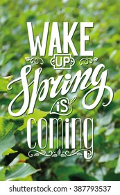 Spring design,Handwriting lettering,quotes.Vector Wake up!Spring is coming.Green leaves nature blurred background.Spring season,springtime wallpaper,text.Web,art, calligraphic Illustration.Vertical
