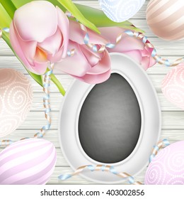 Spring easter frame with fresh flowers with eggs on wooden table with copy space on black board. EPS 10 vector file included