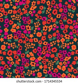 Spring field with poppies. Trendy fabric pattern with small flowers. Botanical seamless print with different floral elements. Vintage textile collection.