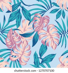 Spring floral seamless composition abstract color tropical leaves blue background. Summer fabric t-shirt exotic pattern wallpaper
