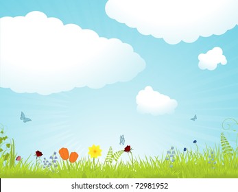 Spring flower landscape with fluffy clouds