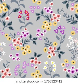 Spring flowers on grey background. Vintage print with small inflorescences. Retro textile collection. Seamless vector pattern.