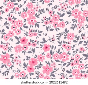 Spring flowers print. Vector seamless floral pattern. Plant design for fashion prints. Endless print made of small coral and pink flowers. Elegant template. White background. Stock vector.