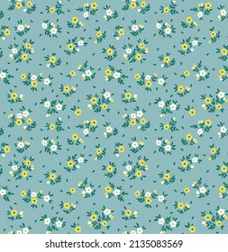 Spring flowers print. Vector seamless floral pattern. Floral design for fashion prints. Endless print made of small white and yellow flowers. Elegant template. Light blue background. Stock vector.