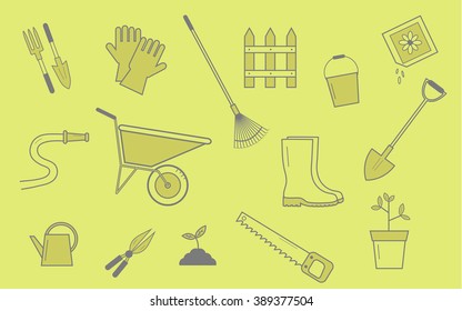 Spring garden background with variety of garden tools placed in random order